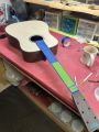 The Adirondack Spruce top began quite blonde before being painted black.
